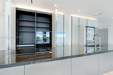 Remarkable unit at a private island in Coconut Grove. Boutique