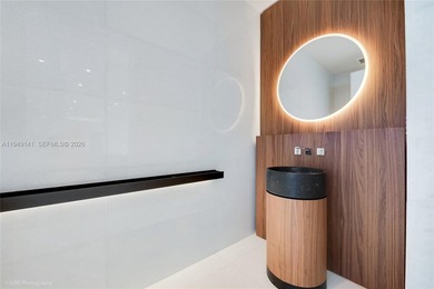 Remarkable unit at a private island in Coconut Grove. Boutique