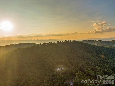 Set across 105.65 acres of pristine mountain landscape, this - photo 2