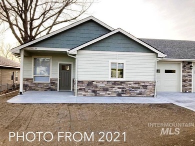 Turnkey income-producing duplex built in 2020 with modern - photo 1