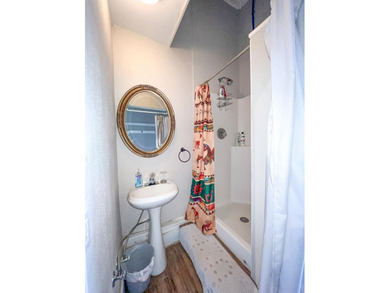 This residential plus commercial property is nestled in historic