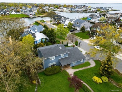 Welcome to this beautifully updated Side Hall Colonial in the - photo 4