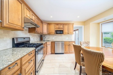 Welcome to this beautifully updated Side Hall Colonial in the - photo 7