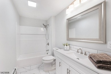 Welcome to this newly renovated bilevel, positioned perfectly on - photo 18