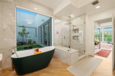 Stunning 3-story, 3,800 sq ft renovated townhouse offering an