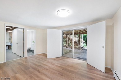 Welcome to this newly renovated bilevel, positioned perfectly on - photo 28