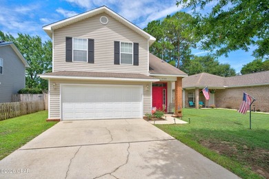 Welcome home to this inviting 3-bedroom, 2.5-bath property - photo 1
