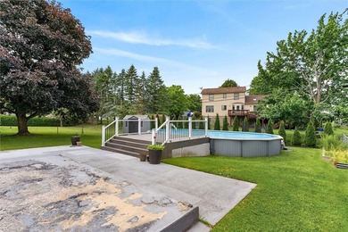 Welcome to 20 Flamingo Dr in Gates, fully renovated ranch-style - photo 4
