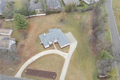 Custom-built all-brick ranch situated on a private 1.41-acre