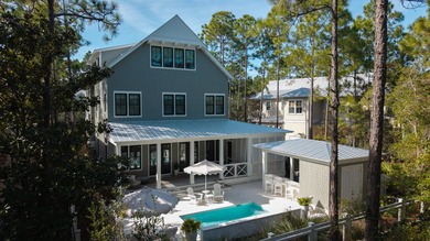 Welcome to one of the finest homes in Watercolor! Built by the - photo 5