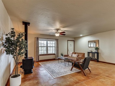 Tucked away on 5 secluded, gated acres, this beautifully crafted