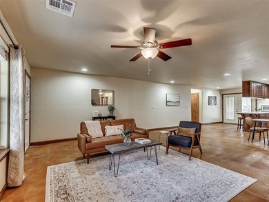 Tucked away on 5 secluded, gated acres, this beautifully crafted