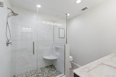 Welcome to 84 Erik Drive, a beautifully updated Devon end unit - photo 18