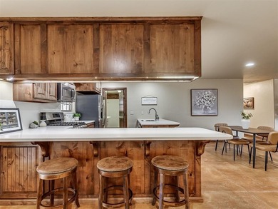 Tucked away on 5 secluded, gated acres, this beautifully crafted