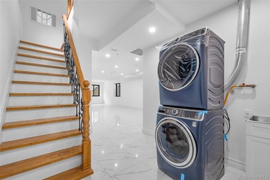 This exquisite corner-lot residence in prime Bayside features a - photo 30