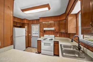 Welcome home to this turnkey 3-bedroom, 2-bath home, 2 miles - photo 9