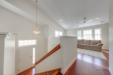 Welcome to this exceptional three-bedroom, 2.1-bath end-unit - photo 4