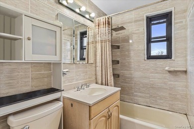 Welcome to this bright one-bedroom upper unit in the highly - photo 9