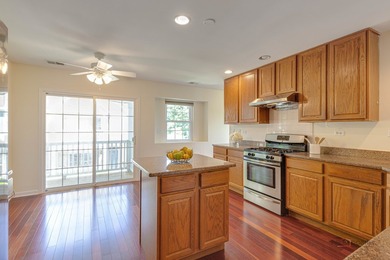 Welcome to this exceptional three-bedroom, 2.1-bath end-unit - photo 9