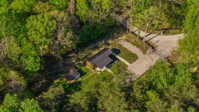 Unrestricted, Lakefront Tiny Home on 5.74 acres! - photo 6