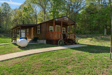 Unrestricted, Lakefront Tiny Home on 5.74 acres! - photo 2