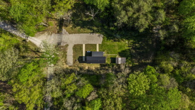 Unrestricted, Lakefront Tiny Home on 5.74 acres! - photo 5