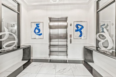 This stunningly upgraded 2-bedroom, 2-bath condo puts you steps - photo 31