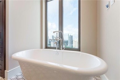 This expansive residence high above the Buckhead skyline at the