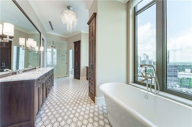 This expansive residence high above the Buckhead skyline at the