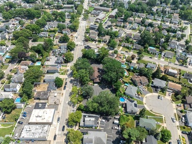 Nestled in the heart of Bellmore, New York, welcome to Oak - photo 16