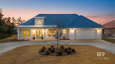 Tucked away on a quiet cul-de-sac within the gated community of - photo 1
