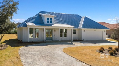 Tucked away on a quiet cul-de-sac within the gated community of - photo 2