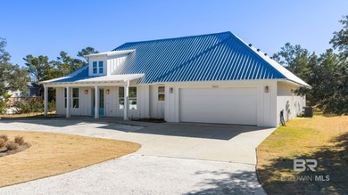 Tucked away on a quiet cul-de-sac within the gated community of - photo 4