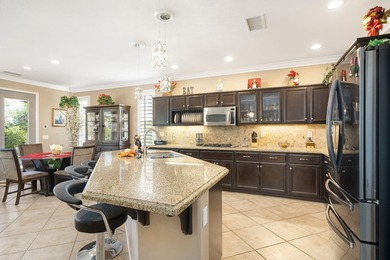 A meticulously maintained Monterey plan with elegant Tuscan - photo 11