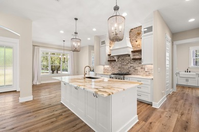 Nestled on 1.38 gated & fenced acres, this custom-built home - photo 13
