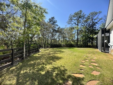 Nestled on 1.38 gated & fenced acres, this custom-built home - photo 20