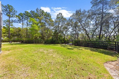 Nestled on 1.38 gated & fenced acres, this custom-built home - photo 21