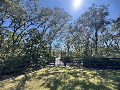 Nestled on 1.38 gated & fenced acres, this custom-built home - photo 22