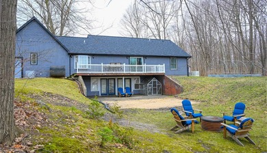 Discover this Cedar ranch walkout home set along the St. Joseph - photo 28
