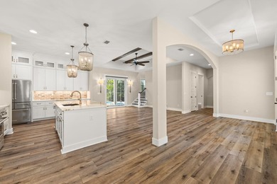 Nestled on 1.38 gated & fenced acres, this custom-built home - photo 31