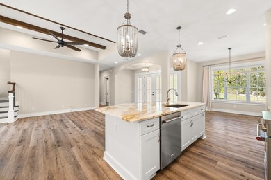 Nestled on 1.38 gated & fenced acres, this custom-built home - photo 35