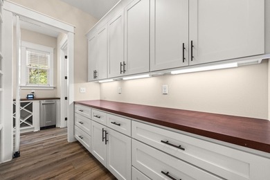 Nestled on 1.38 gated & fenced acres, this custom-built home - photo 36