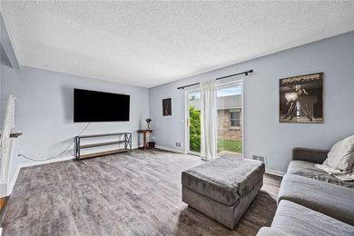 Brighton welcomes you home to this beautifully updated end-unit - photo 8