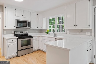 Traditional brick home on a lovely wooded lot near the best of - photo 2
