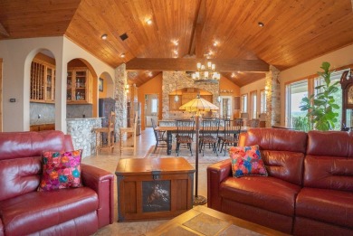 Stunning custom home on gorgeous 35.04 acres (per plat) within