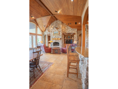 Stunning custom home on gorgeous 35.04 acres (per plat) within