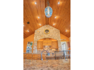 Stunning custom home on gorgeous 35.04 acres (per plat) within