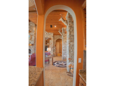 Stunning custom home on gorgeous 35.04 acres (per plat) within