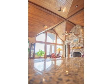 Stunning custom home on gorgeous 35.04 acres (per plat) within