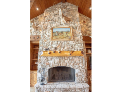 Stunning custom home on gorgeous 35.04 acres (per plat) within